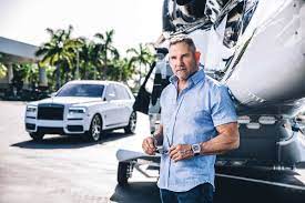 Grant Cardone in front of jet